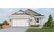 A cozy one-story house with neutral colors and a two-car garage, perfect for a small Gathering at 13120 Bayberry Way, Parrish, FL 34219