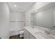 Bright bathroom featuring a shower/tub combo, and dual sinks with quartz countertop at 13132 Bayberry Way, Parrish, FL 34219