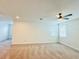 A bonus room with neutral carpet and two windows at 14921 Barrows Bluff Ter, Bradenton, FL 34212