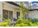 Landscaped backyard area featuring a lovely fountain and lush greenery, creating a tranquil outdoor space at 14921 Barrows Bluff Ter, Bradenton, FL 34212