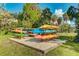 Kayak storage area with neatly arranged kayaks, providing easy access for residents to enjoy water activities and scenic river views at 14921 Barrows Bluff Ter, Bradenton, FL 34212