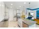 Well-equipped kitchen with granite countertops, stainless appliances, and a view of living area at 14921 Barrows Bluff Ter, Bradenton, FL 34212