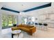 An open-concept design connects the kitchen and living spaces, enhanced by natural light and stylish decor at 14921 Barrows Bluff Ter, Bradenton, FL 34212