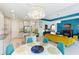The spacious living area flows into the kitchen and dining space, creating an inviting atmosphere for gatherings at 14921 Barrows Bluff Ter, Bradenton, FL 34212