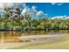 Scenic river view showcasing the lush greenery and serene waters, creating a picturesque natural setting at 14921 Barrows Bluff Ter, Bradenton, FL 34212