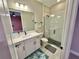 Modern bathroom showcasing a glass-enclosed shower and sleek vanity with contemporary fixtures at 16905 Sweetwater Village Dr, Bradenton, FL 34211