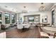Spacious clubhouse with ample seating, stylish decor, and large windows with natural light at 16905 Sweetwater Village Dr, Bradenton, FL 34211