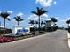 Welcome to Sweetwater with meticulously manicured landscaping at the main entrance and guardhouse at 16905 Sweetwater Village Dr, Bradenton, FL 34211