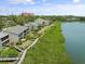 Scenic waterfront homes with lush landscaping and boardwalks, offering tranquil views at 1703 Pelican Cove Rd # 356, Sarasota, FL 34231