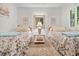 Serene bedroom with twin beds, soft lighting, and stylish decor at 1703 Pelican Cove Rd # 356, Sarasota, FL 34231