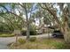 Street view of condo with signage for Pelican Cove Road at 1703 Pelican Cove Rd # 356, Sarasota, FL 34231