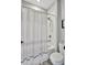 Bathroom featuring white shower curtain at 17032 Harvest Moon Way, Bradenton, FL 34211