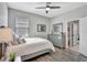 Comfortable bedroom featuring a large window and neutral decor at 17032 Harvest Moon Way, Bradenton, FL 34211