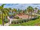 Aerial view of the community playground with vibrant play structures, picnic area, and landscaping at 17032 Harvest Moon Way, Bradenton, FL 34211