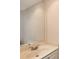 Bathroom with modern vanity, bright lighting, and an ample mirror at 1831 Burgos Dr, Sarasota, FL 34238