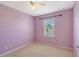 Cozy bedroom with plush carpet and a bright window at 1831 Burgos Dr, Sarasota, FL 34238