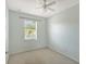 Neutral carpeted bedroom with window view at 1831 Burgos Dr, Sarasota, FL 34238
