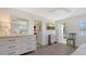Bright bedroom boasts neutral decor and an exterior door to the outside at 1857 Jasmine Dr, Sarasota, FL 34239