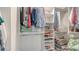 Organized walk-in closet with ample shelving and hanging space at 1857 Jasmine Dr, Sarasota, FL 34239