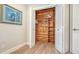 Spacious closet with custom wood shelving and ample storage space at 1857 Jasmine Dr, Sarasota, FL 34239