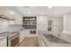Bright kitchen boasts stylish countertops and stainless steel appliances at 1857 Jasmine Dr, Sarasota, FL 34239