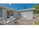 Outdoor patio with charming seating area, perfect for relaxing and enjoying outdoor living at 1857 Jasmine Dr, Sarasota, FL 34239