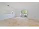 Bright room with a big window that lets lots of light into the house at 2136 Bendway Dr, Port Charlotte, FL 33948