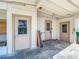 Spacious carport featuring multiple doors and ample room for parking and storage at 21966 Belinda Ave, Port Charlotte, FL 33952