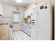 Functional kitchen featuring updated appliances and ample cabinet space at 21966 Belinda Ave, Port Charlotte, FL 33952