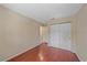 Neutral bedroom featuring hardwood floors and closet at 2226 Fairfield Ave, Sarasota, FL 34232