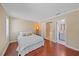Spacious bedroom with hardwood floors leading to a bathroom and separate room at 2226 Fairfield Ave, Sarasota, FL 34232