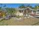 A well-maintained home with tidy landscaping featuring rocks and fresh mulch at 2226 Fairfield Ave, Sarasota, FL 34232