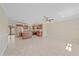 Bright open-concept kitchen featuring granite countertops, stainless steel appliances, island and tile floors at 2226 Fairfield Ave, Sarasota, FL 34232