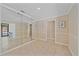 Hallway with wall decor, tile floors, and access to other rooms within the home at 2226 Fairfield Ave, Sarasota, FL 34232