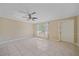 Bright living room with tile flooring, a large window, and neutral paint, providing an inviting space at 2226 Fairfield Ave, Sarasota, FL 34232