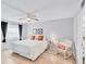 Spacious bedroom with tile flooring, ceiling fan, and plenty of natural light at 2280 Stickney Point Rd # 420, Sarasota, FL 34231