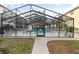 Relaxing screened-in pool area featuring comfortable lounge chairs and clear, sparkling water for residents to enjoy at 2280 Stickney Point Rd # 420, Sarasota, FL 34231