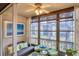 Charming porch with cozy seating and serene views, perfect for relaxation at 2280 Stickney Point Rd # 420, Sarasota, FL 34231