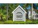 Attractive neighborhood sign for the Capetown Village Community with lush landscaping at 2306 64Th W St # 17, Bradenton, FL 34209