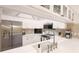 Well-appointed kitchen with stainless steel appliances, bright white cabinets, and a sleek, modern design at 2306 64Th W St # 17, Bradenton, FL 34209