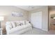 Inviting living room featuring a cozy couch, and a closet for storing belongings at 2306 64Th W St # 17, Bradenton, FL 34209