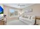 Relaxing living room with a comfortable sofa, ceiling fan, and natural light from the window at 2306 64Th W St # 17, Bradenton, FL 34209