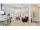 Well-lit office with wood floors, large windows, and neutral wall color at 2306 64Th W St # 17, Bradenton, FL 34209