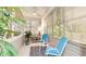 Relaxing sunroom with comfortable seating, coastal accents, and natural light creating a serene atmosphere at 2306 64Th W St # 17, Bradenton, FL 34209