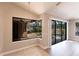 Dining area featuring tile floors and views of the pool and outdoor space through sliding glass doors at 235 Dahlia Ct, Bradenton, FL 34212