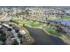 Aerial photograph of the golf course, ponds, community streets, and neighborhood layout at 2407 New Haven Cir, Sun City Center, FL 33573