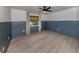 Spacious bedroom with neutral paint and flooring, base molding, and ample natural light at 245 Woodingham Trl, Venice, FL 34292