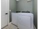 Laundry room featuring a modern washer and dryer set at 245 Woodingham Trl, Venice, FL 34292