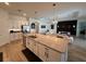 Spacious kitchen island with granite countertops and stainless steel appliances at 25240 Keygrass Ct, Punta Gorda, FL 33955