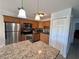 Beautifully updated kitchen with stainless steel appliances and granite countertops at 3447 Clark Rd # 246, Sarasota, FL 34231